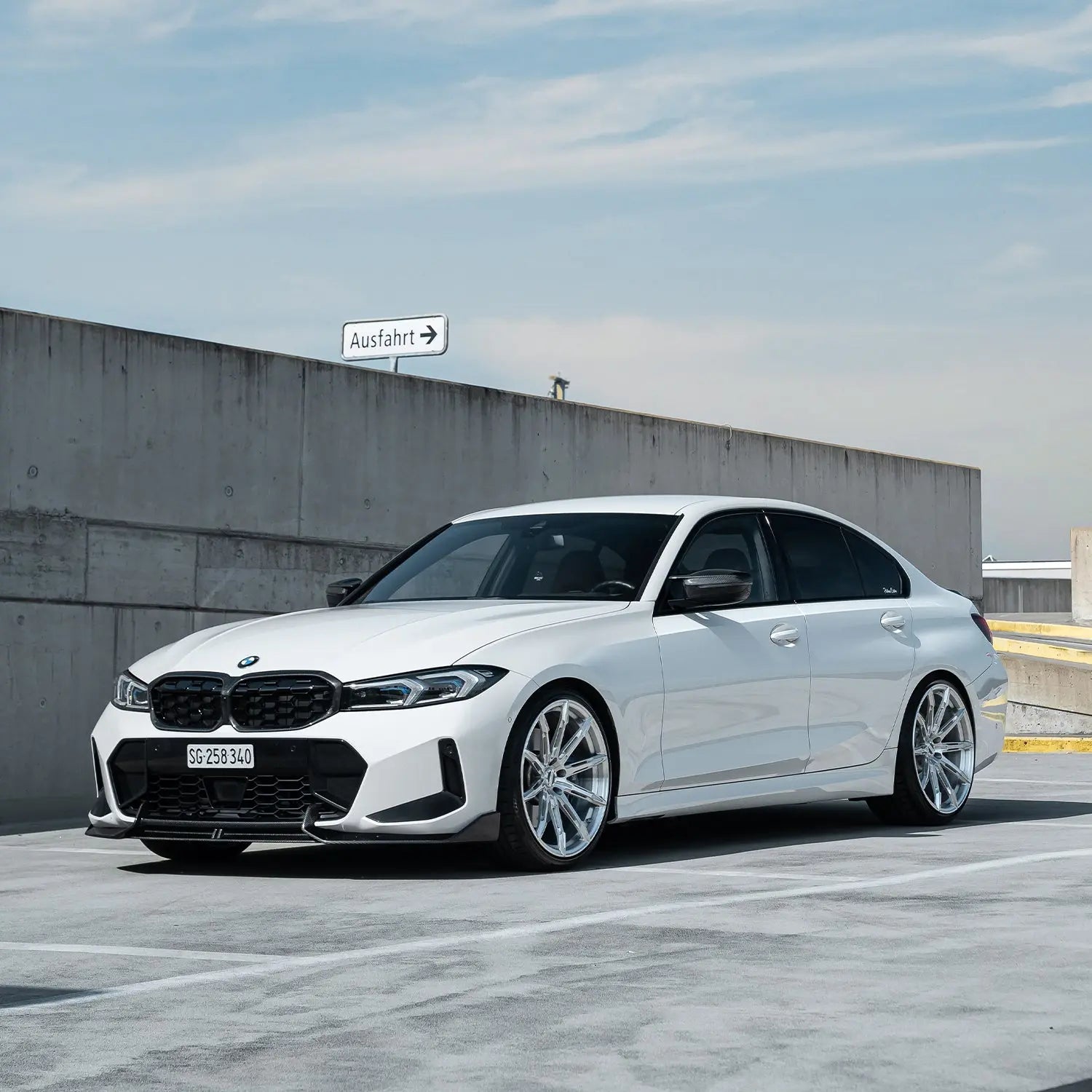 BMW 3 Series G20/G21 Touring with Radi8 R806 20 inch Silver wheels – outdoor dynamic shot