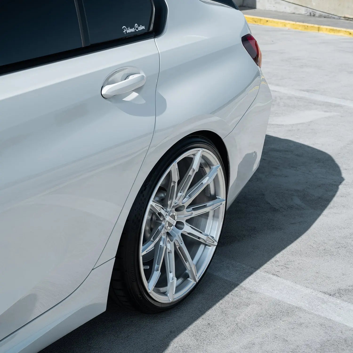 Side view of BMW 3 Series G20/G21 fitted with Radi8 R806 20 inch Silver – premium sporty stance