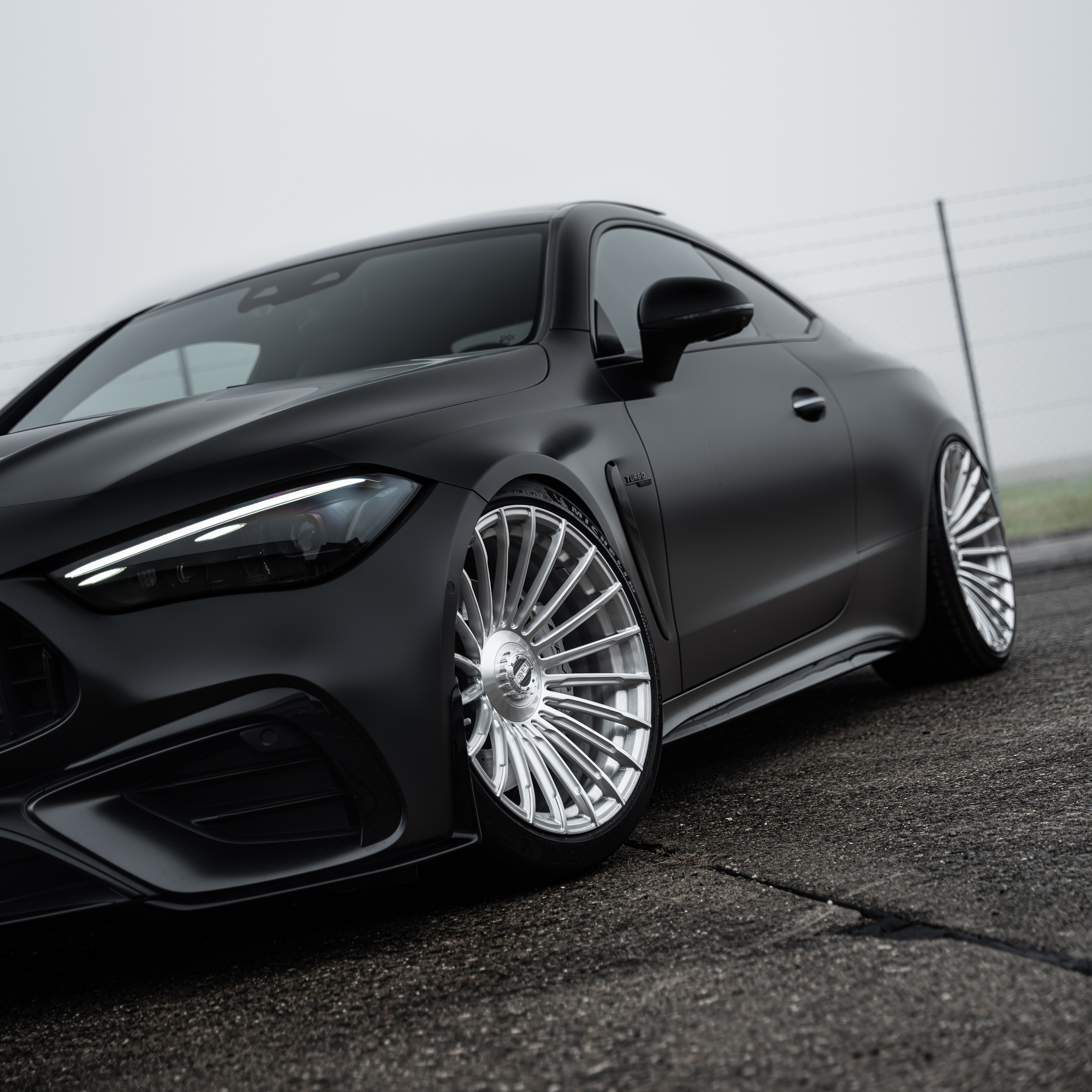 Rear quarter angle highlighting the Monoblock Forged, Concave, Deep Concave, Multi Spoke stance of the Radi8 R802 on the CLE 53 AMG . | Monoblock Forged, Concave, Deep Concave, Multi Spoke Felgen