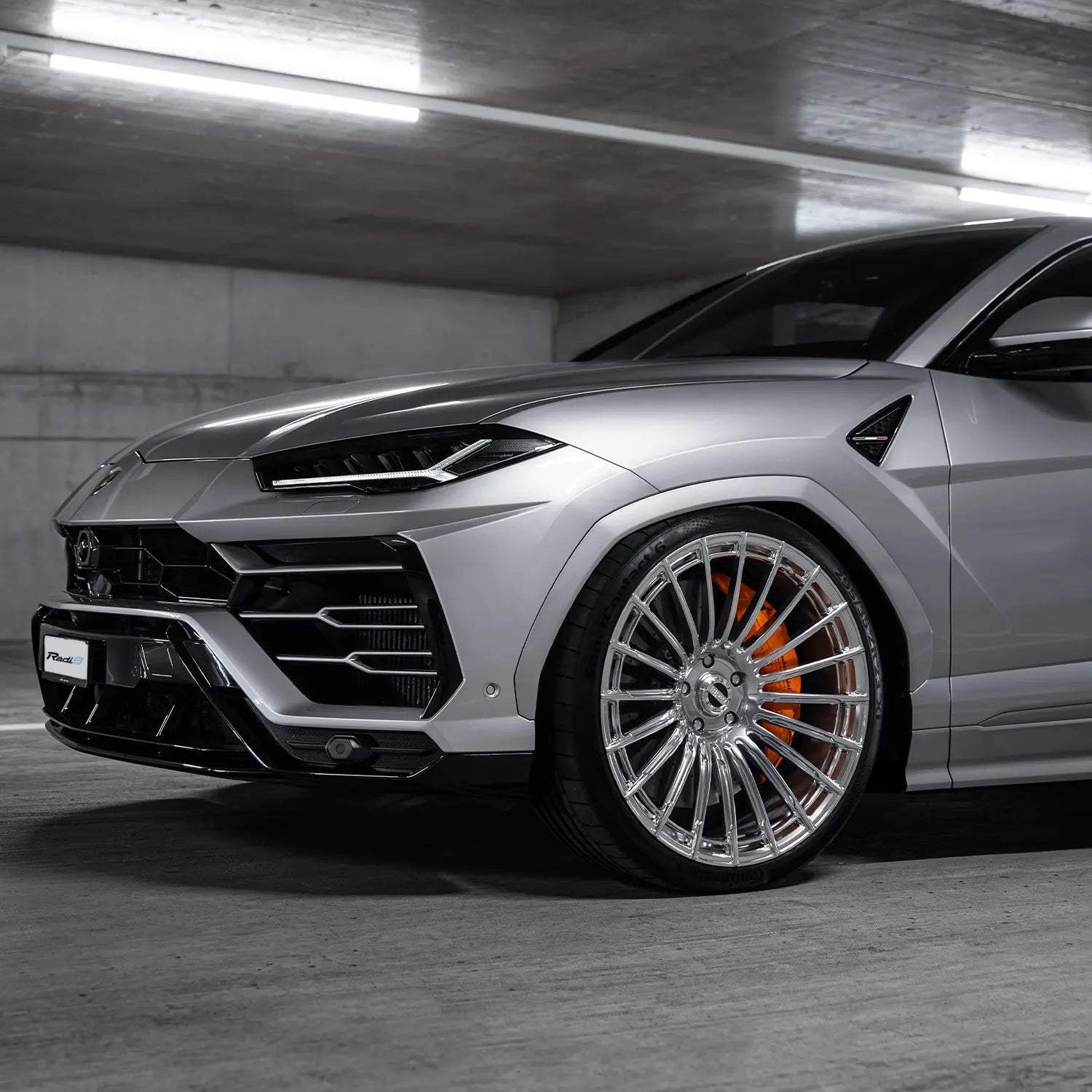 Lamborghini Urus front angle with Radi8 R802 forged rims – premium performance